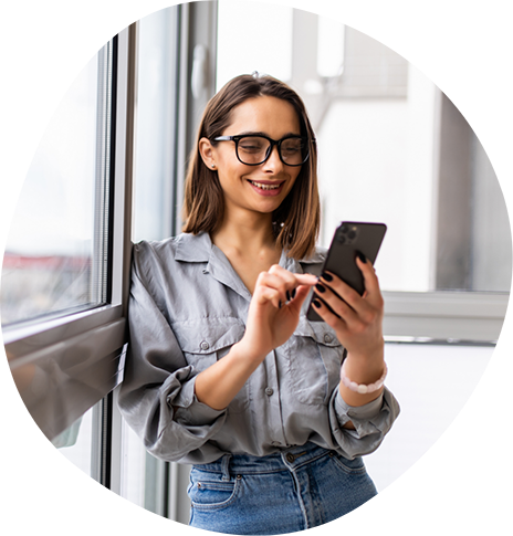 Woman tapping on her phone