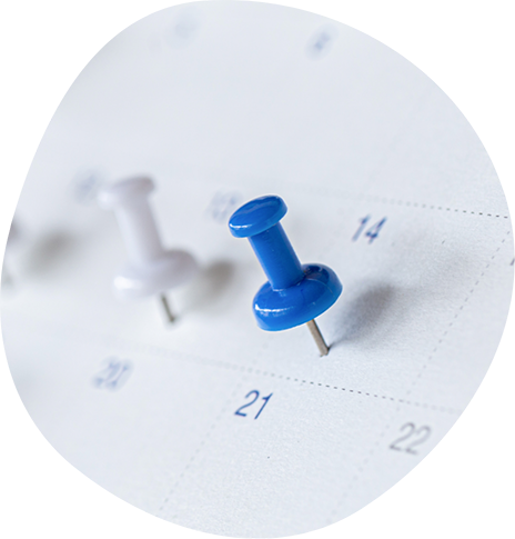 Pushpins on a calendar