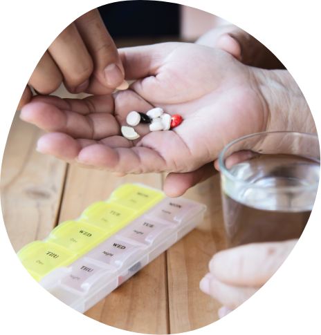 Person getting ready to take pill medication