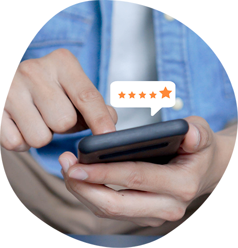 Person leaving a five star review on their phone