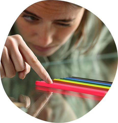 Person sorting straws by color